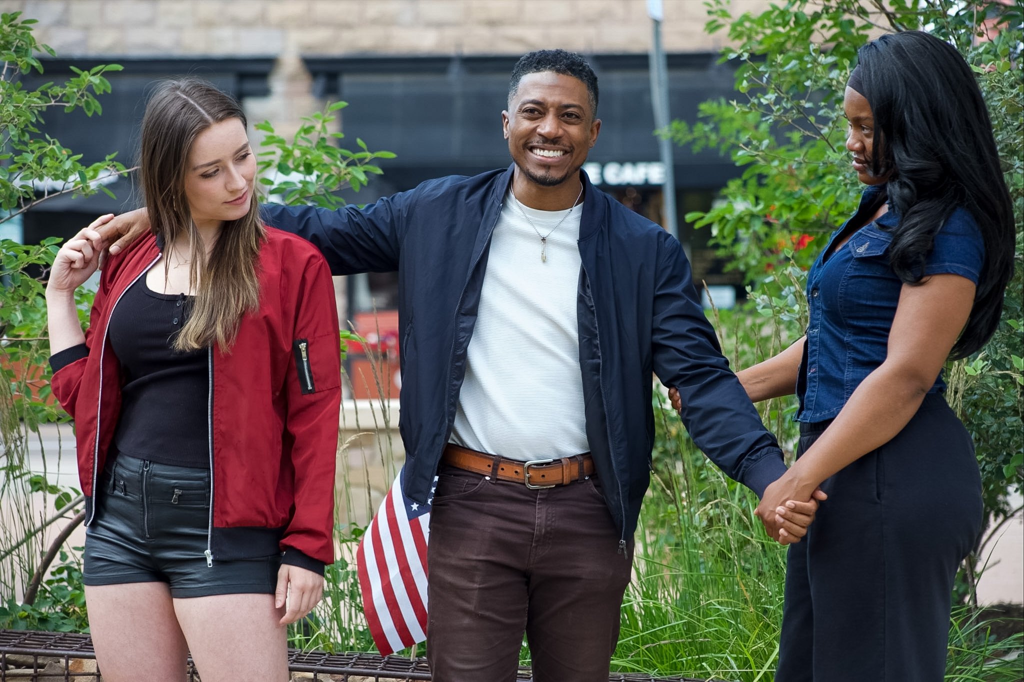 Three Between Two Lives characters in a tense moment outdoors